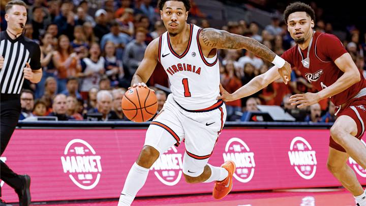 Malik Thomas drives by a defender en route to an 87-53 victory over Rider Malik Thomas drives by a defender en route to an 87-53 victory over Rider