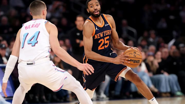 The New York Knicks' Mikal Bridges (25) dribbles while being defended by the Miami Heat's Tyler Herro (14) during Monday night's game in Madison Square Garden, New York, on March 17th, 2025. The New York Knicks' Mikal Bridges (25) dribbles while being defended by the Miami Heat's Tyler Herro (14) during Monday night's game in Madison Square Garden, New York, on March 17th, 2025.