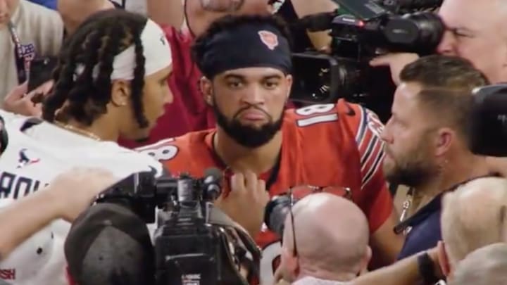 C.J. Stroud meets with Caleb Williams after the Texans' win over the Bears. 