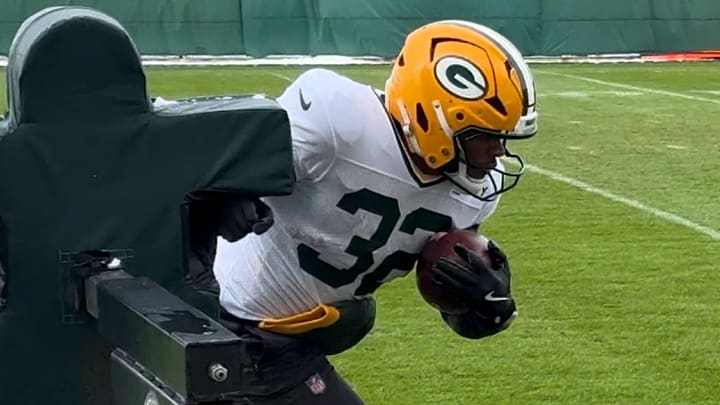 MarShawn Lloyd runs through a drill at Packers practice on Wednesday.