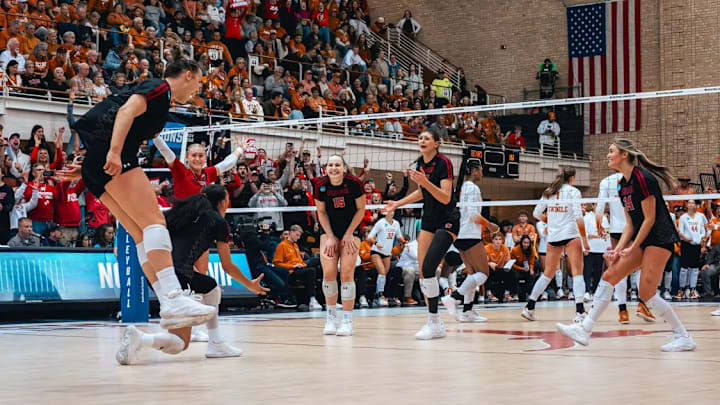 Wisconsin volleyball celebrates a point scored in the NCAA Regional Finals. The Badgers beat No.1 Texas, 3-1, to advance to the Final Four. Wisconsin volleyball celebrates a point scored in the NCAA Regional Finals. The Badgers beat No.1 Texas, 3-1, to advance to the Final Four.