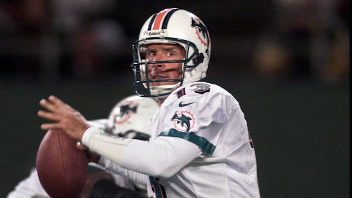 Miami Dolphins QB Dan Marino eyes Stanley Prichett for a short pass against the Jets during the 1999 season.