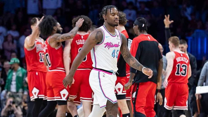 Davion Mitchell walks to the team huddle after a timeout is called during Heat-Bulls Davion Mitchell walks to the team huddle after a timeout is called during Heat-Bulls