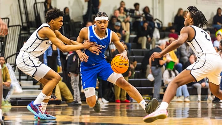 RJ Young fighting through contact during Bryant's 63-53 win over Little Rock Central last Tuesday