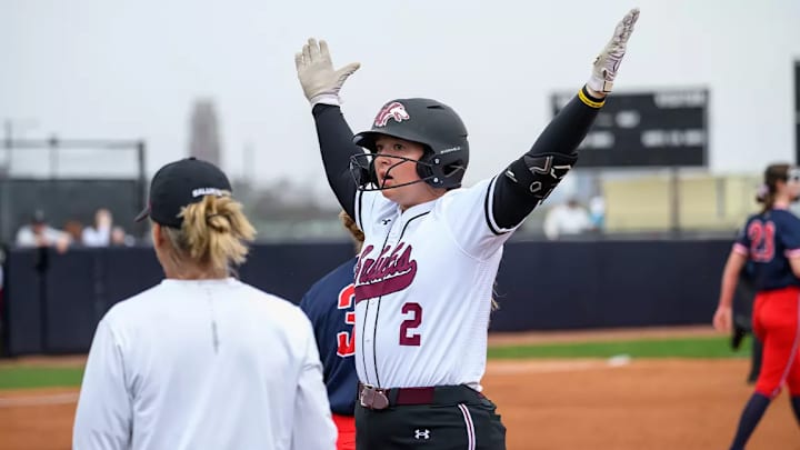 Southern Illinois' Emily Williams stands on first after collecting a hit against Belmont in a 3-0 win.
