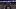 Close-up of TCU tight end Ka’Morreun Pimpton in uniform with his orange mouthguard hanging from his facemask and fans behind Close-up of TCU tight end Ka’Morreun Pimpton in uniform with his orange mouthguard hanging from his facemask and fans behind