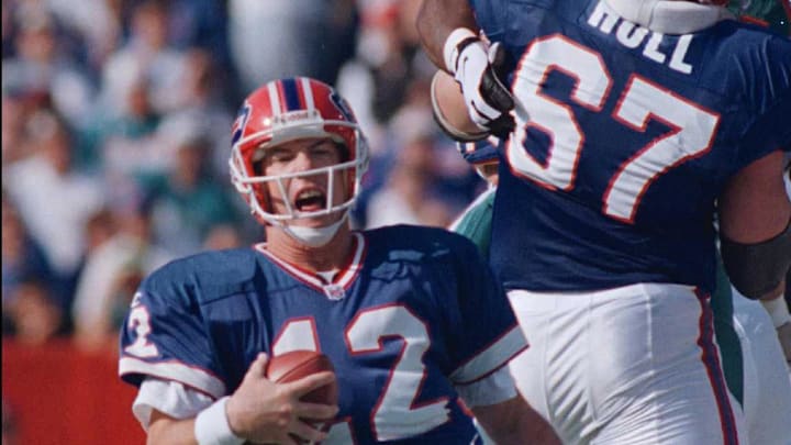Jim Kelly threw for 381 yards in a shootout victory over Miami.

Bills Vs Dolphins