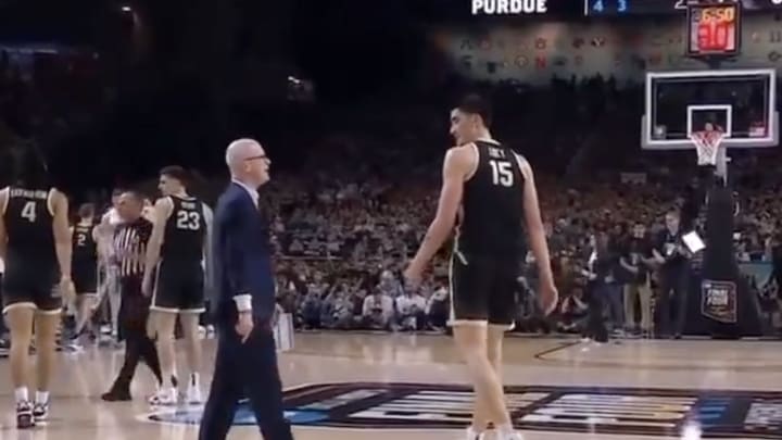UConn Huskies coach Dan Hurley talks with Purdue Boilermakers center Zach Edey during the men's national championship. UConn Huskies coach Dan Hurley talks with Purdue Boilermakers center Zach Edey during the men's national championship.