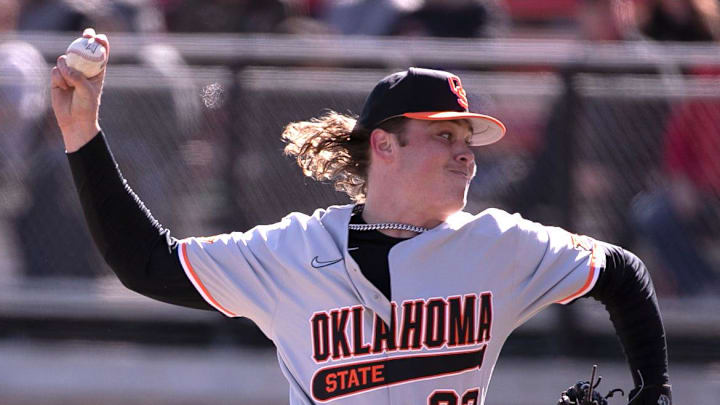 Oklahoma State's Gabe Davis (22) pitches against Texas Tech in game two of the Big 12 home opener, Saturday, March 18, 2023, at Rip Griffin Park.