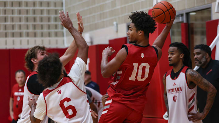 Indiana men's basketball forward Josh Harris passes out of a double team July 30, 2025, at Cook Hall in Bloomington. Indiana men's basketball forward Josh Harris passes out of a double team July 30, 2025, at Cook Hall in Bloomington.