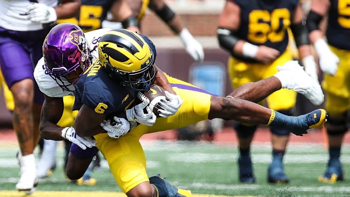 Michigan wide receiver Cornelius Johnson makes a catch against East Carolina defensive back Shavon Revel during the second half of U-M's 30-3 win on Saturday, Sept. 2, 2023, at Michigan Stadium.