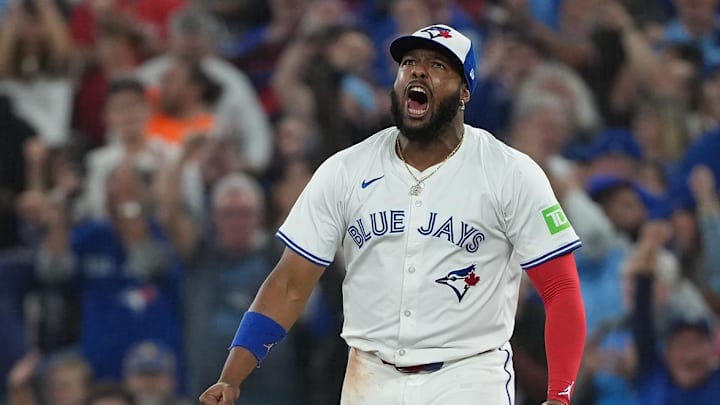 Oct 19, 2025; Toronto, Ontario, CAN; Toronto Blue Jays first baseman Vladimir Guerrero Jr. (27) celebrates after a double play in the fourth inning against the Seattle Mariners during game six of the ALCS round for the 2025 MLB playoffs at Rogers Centre.