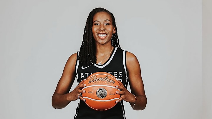 Ariel Atkins poses in a new headshot for AU Pro Basketball