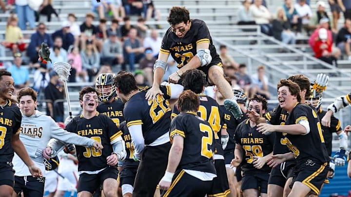 The St. Anthony's boys lacrosse team celebrates after beating Chaminade in the CHSAA championship game on Thursday.