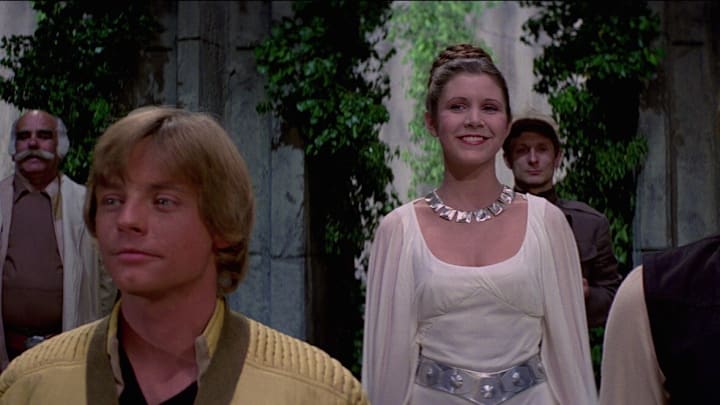 Star Wars: A New Hope. Luke Skywalker (Mark Hamill), Leia Organa (Carrie Fisher), Han Solo (Harrison Ford). Image Credit: StarWars.com