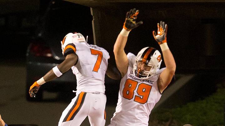 Sep 14, 2013; Salt Lake City, UT, USA; Oregon State Beavers wide receiver Brandin Cooks (7) and tight end Connor Hamlett (89) celebrate a touchdown by Cooks during the second half against the Utah Utes at Rice-Eccles Stadium. Oregon State won 51-48 in overtime. Mandatory Credit: Russ Isabella-Imagn Images