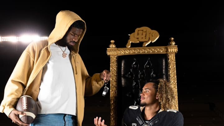 Shedeur Sanders hands the proverbial keys to Carrollton (Georgia) five-star quarterback Julian Lewis during his official visit to Boulder