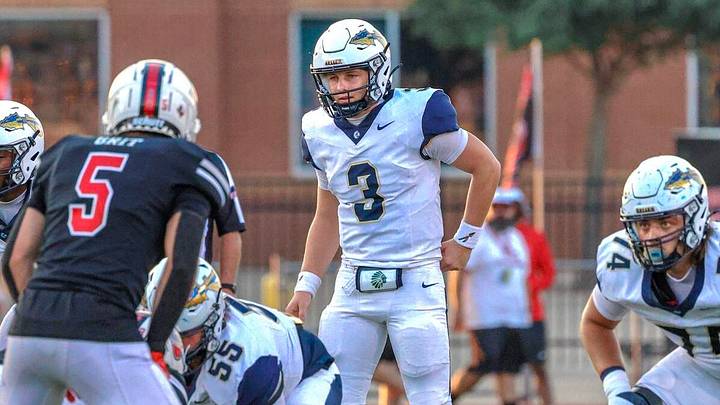 Keller quarterback Matt McCroskey gets set to run a play during a recent ballgame. Keller quarterback Matt McCroskey gets set to run a play during a recent ballgame.