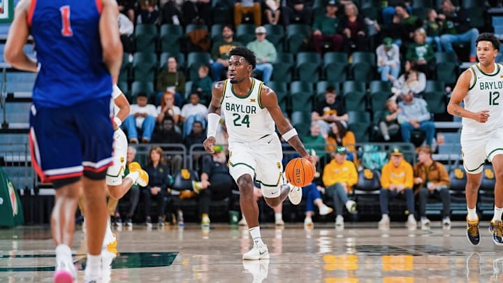 Tounde Yessoufou takes the ball up in the first half against Arlington Baptist.