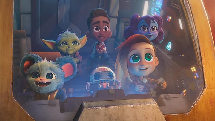 (L-R) Back Row: Master Yoda (Piotr Michael), Kai Brightstar (JeCobi Swain), Lys Solay (Juliet Donenfeld), Front Row: Nubs, RJ-83, and Nash Durango (Emma Berman) in Star Wars: Young Jedi Adventures "Yoda Rescue." Image Credit: StarWars.com