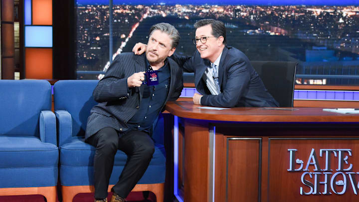 Craig Ferguson and Stephen Colbert posing together on the set of The Late Show