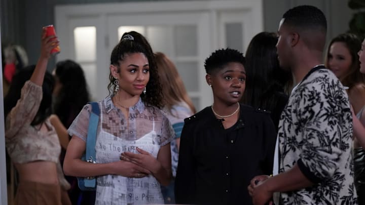 All American -- "Got Your Money" -- Image Number: ALA409b_0195r.jpg -- Pictured (L-R): Chelsea Tavares as Patience, Bre-Z as Coop and Daniel Ezra as Spencer James -- Photo: Troy Harvey/The CW -- (C) 2022 The CW Network, LLC. All Rights Reserved.