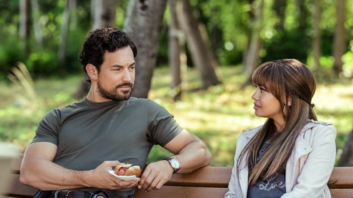 Wild Cards -- “Howl to Get Away with Murder” -- Image Number: WCD103a_0042r -- Pictured (L-R) : Giacomo Gianniotti as Ellis and Vanessa Morgan as Max -- Photo Credit: Ed Araquel/The CW -- © 2023 The CW Network, LLC. All Rights Reserved.