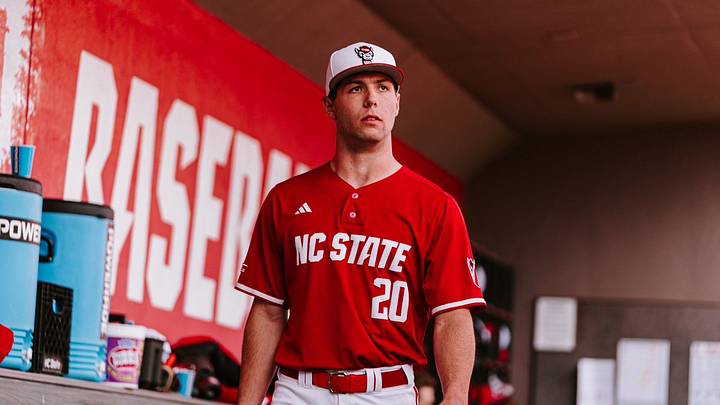 NC State left-handed pitcher Ryan Marohn watches his team bat from the dugout in the Wolfpack's 4-2 win over Boston College on March 13, 2026. 