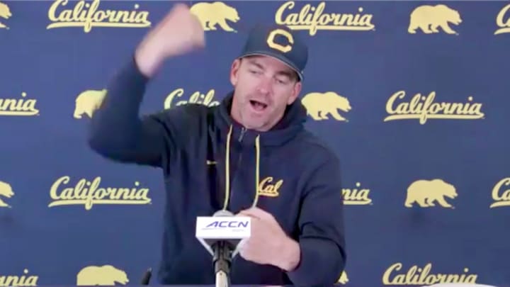 Justin Wilcox shows the technique for punching a ball loose. Justin Wilcox shows the technique for punching a ball loose.