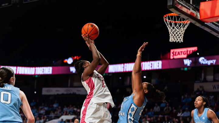Freshman guard Milan Brown attempts a contested layup against the North Carolina Tar Heel, Feb. 8, 2026.