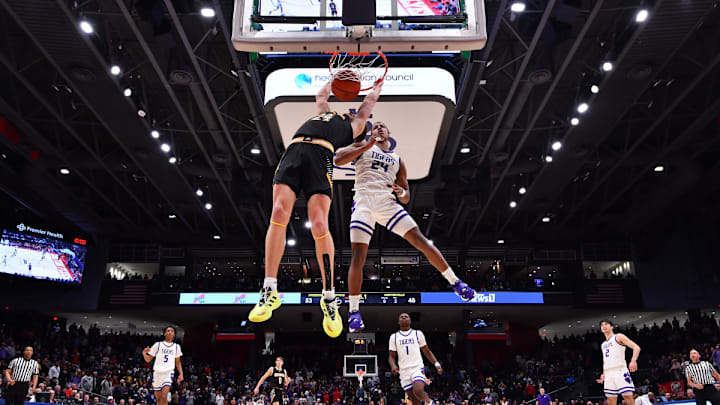 Sonny Styles, right, played taller than 6-foot-4 as a rim protector for Pickerington Central High School in Ohio.