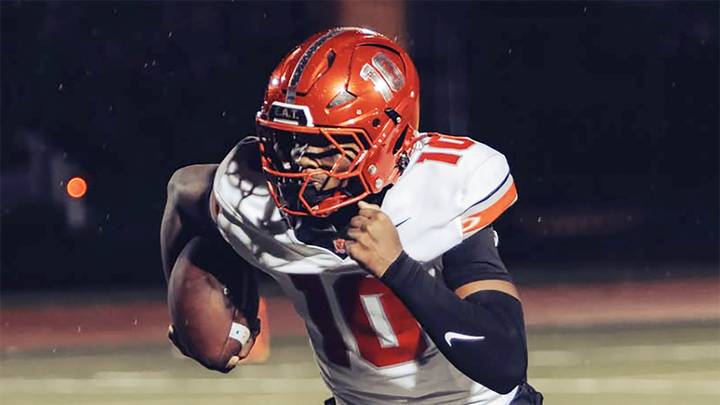 Concordia Prep's Justin Dixon races for yardage during the Saints 17-14 win over Calvert Hall, Friday night in Towson. Concordia Prep's Justin Dixon races for yardage during the Saints 17-14 win over Calvert Hall, Friday night in Towson.