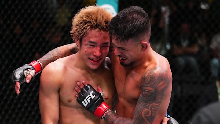 Brandon Royval and Tatsuro Taira embrace following their UFC Vegas 98 war.