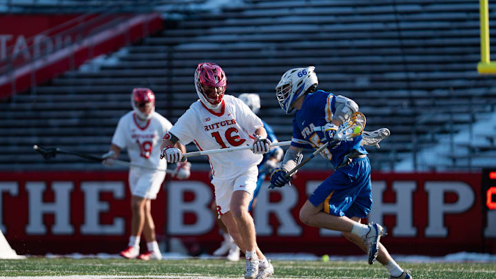Rutgers defender Colin Kelly in action against Hofstra in a lacrosse match, Saturday, February 28th, at Shi Stadium, Piscataway, NJ. Rutgers defender Colin Kelly in action against Hofstra in a lacrosse match, Saturday, February 28th, at Shi Stadium, Piscataway, NJ.