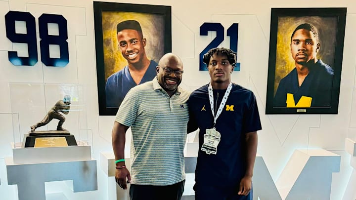 Michigan running backs coach Tony Alford and top running back target Savion Hiter