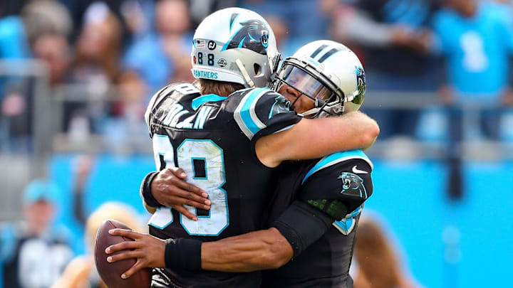 Nov 4, 2018; Charlotte, NC, USA; Carolina Panthers quarterback Cam Newton (1) hugs tight end Greg Olsen (88) after a touchdown in the second quarter against the Tampa Bay Buccaneers at Bank of America Stadium. 