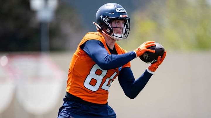 Denver Broncos rookie tight end Caleb Lohner catches a pass at rookie minicamp on Friday, May 9, at Broncos Park, Powered by CommonSpirit. Denver Broncos rookie tight end Caleb Lohner catches a pass at rookie minicamp on Friday, May 9, at Broncos Park, Powered by CommonSpirit.