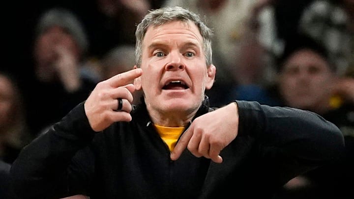 Iowa associate head coach Terry Brands reacts during a match against the Penn State Nittany Lions Jan. 16, 2026 at Carver-Hawkeye Arena in Iowa City, Iowa.