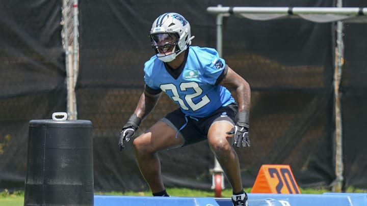 Jun 11, 2025; Charlotte, NC, USA; Carolina Panthers linebacker Trevin Wallace (32) performs a mobility drill during minicamp at Bank of America Stadium. 
