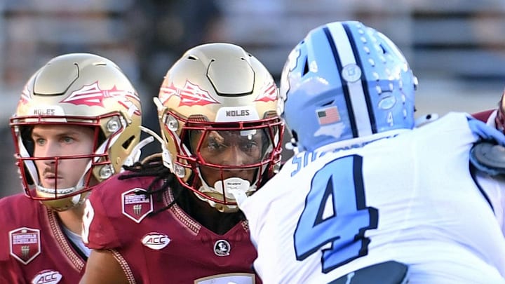 Nov 2, 2024; Tallahassee, Florida, USA; Florida State Seminoles running back Kam Davis (3) runs the ball against the North Carolina Tarheels in the third quarter at Doak S. Campbell Stadium. Mandatory Credit: Robert Myers-Imagn Images