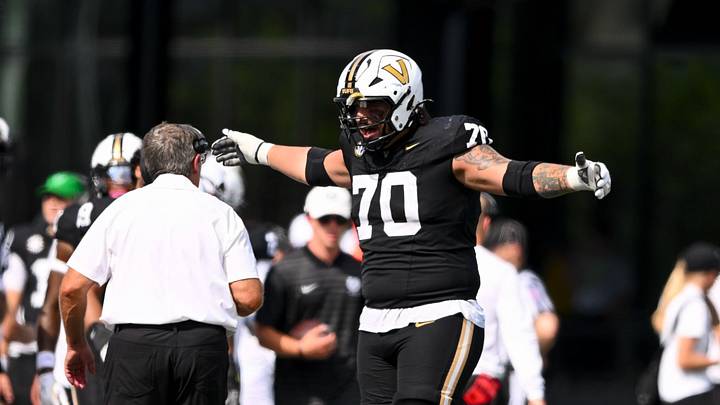 Sep 27, 2025; Nashville, Tennessee, USA; Vanderbilt Commodores offensive lineman Cade McConnell (70) gestures to his coach against the Utah State Aggies during the second half at FirstBank Stadium. Mandatory Credit: Steve Roberts-Imagn Images