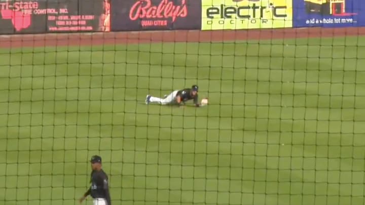 Hunter Ensley dives to make one of his two standout catches of the game