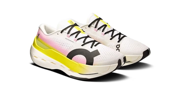 The On Cloudboom Max in the "Lime | Raspberry" colorway.