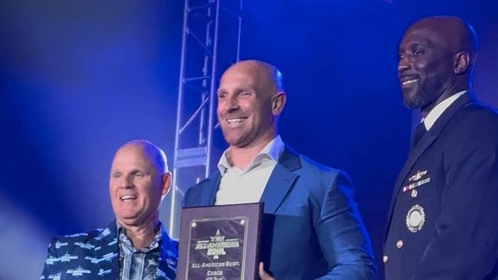 Chicago Mount Carmel head coach Jordan Lynch was named the Coach of the Year at the Navy All-American Bowl awards show on Friday in San Antonio, Texas. Chicago Mount Carmel head coach Jordan Lynch was named the Coach of the Year at the Navy All-American Bowl awards show on Friday in San Antonio, Texas.
