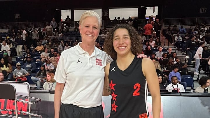 Aaliyah Chavez (right) poses with her high school coach Jill Schneider one last time after winning the game MVP honors Friday at the Jordan Brand Classic in Washington D.C. 