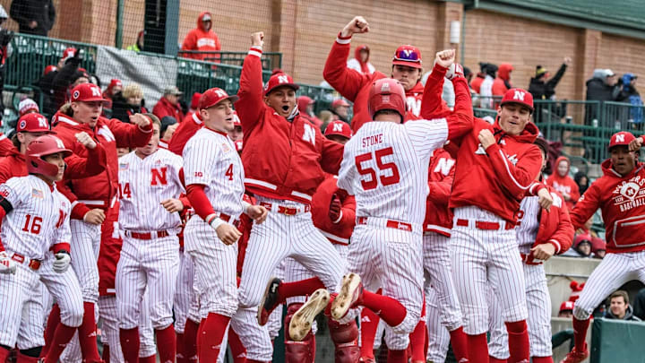 The Husker dugout celebrates Tyler Stone's (55) solo home run in the second inning.