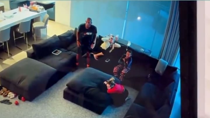 Reggie Miller and family watching Game 1 of the NBA Finals.