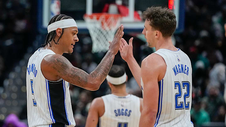 Paolo Banchero, Franz Wagner and Jalen Suggs of the Orlando Magic during an NBA game versus the Washington Wizards. Paolo Banchero, Franz Wagner and Jalen Suggs of the Orlando Magic during an NBA game versus the Washington Wizards.