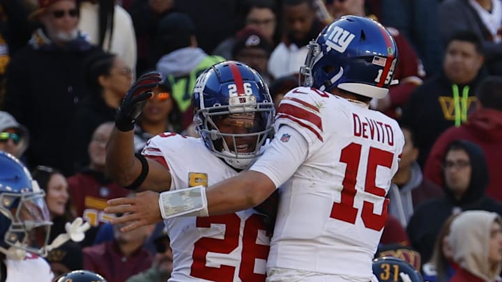 Nov 19, 2023; Landover, Maryland, USA; New York Giants running back Saquon Barkley (26) and Giants