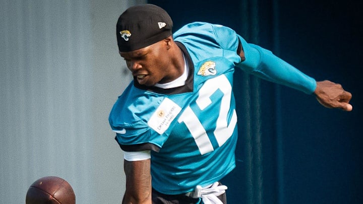 Jacksonville Jaguars wide receiver Travis Hunter (12) tries to catch a ball during drills during the seventh organized team activity at the Miller Electric Center in Jacksonville, Fla. Monday, June 2, 2025. [Doug Engle/Florida Times-Union]